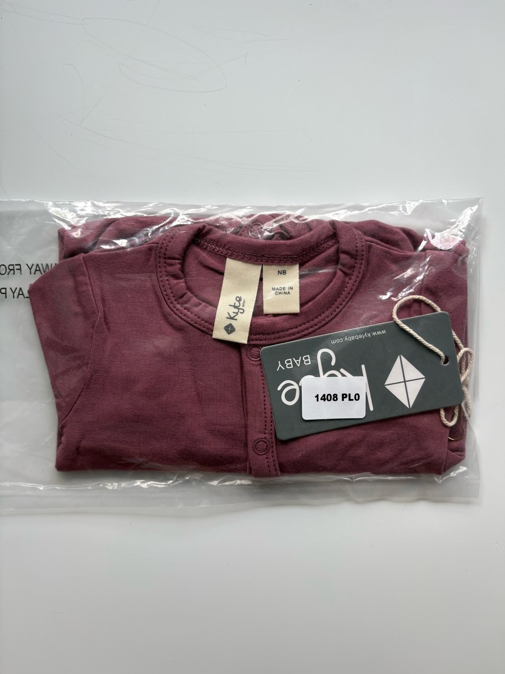 Kyte Baby Newborn Snap Footie in Plum